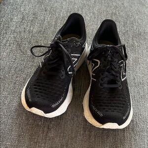 New Balance woman’s Black and White Fresh Foam Athletic Shoes